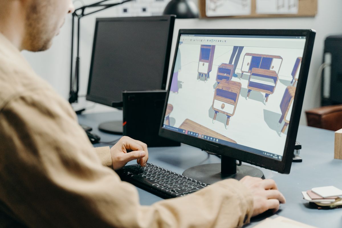 A designer working on animated graphics, keyframes visible across the screen