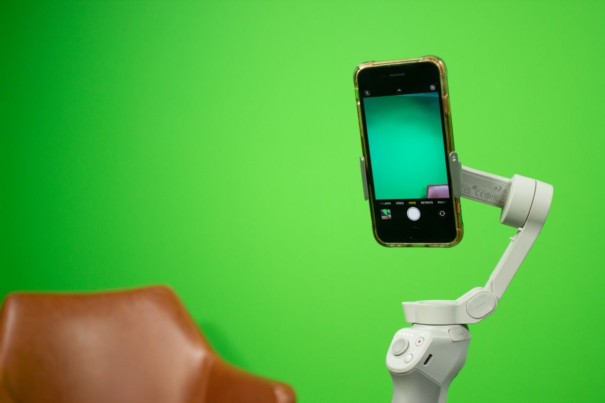 A phone framing a product on a desk in portrait orientation