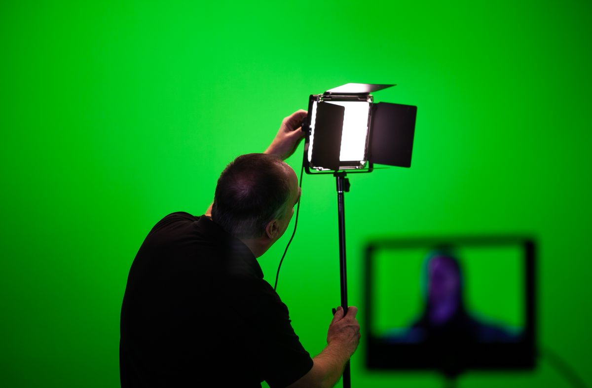 A lighting setup being adjusted before a shoot, the part of the budget you can see